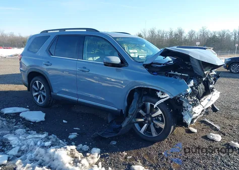 2025 Honda Pilot Touring z USA, uszkodzony, nr VIN 5FNYG1H72SB131781